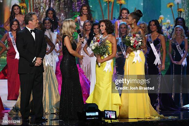 Hosts Todd Newton and Former Miss Wisconsin Alex Wehrley speak onstage with Miss Congeniality winners Miss Alaska Kimberly Dawn Agron and Miss...
