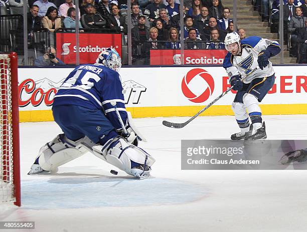 David Backes of the St. Louis Blues beats Jonathan Bernier of the Toronto Maple Leafs for a goal during an NHL game at the Air Canada Centre on March...