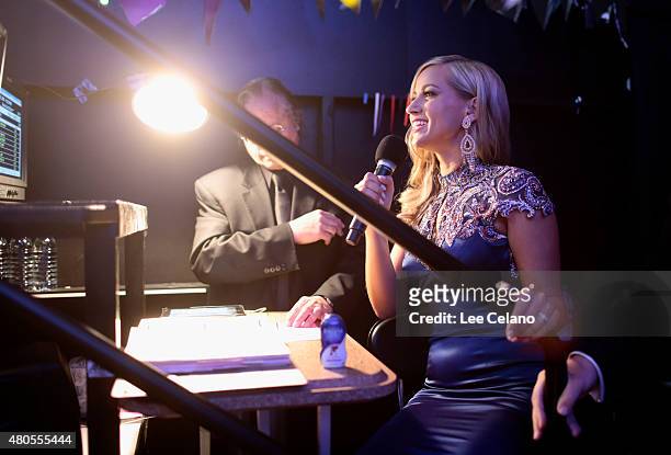 Host Former Miss Wisconsin Alex Wehrley waits backstage at the 2015 Miss USA Pageant Only On ReelzChannel at The Baton Rouge River Center on July 12,...