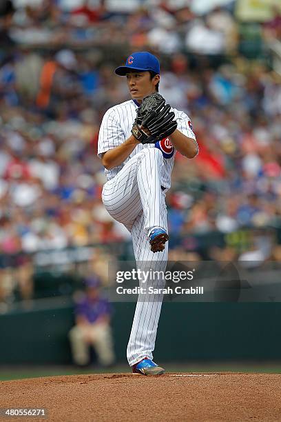 Tsuyoshi Wada of the Chicago Cubs pitches during a game against the Los Angeles Angels of Anaheim at Cubs Park on March 25, 2014 in Mesa, Arizona....