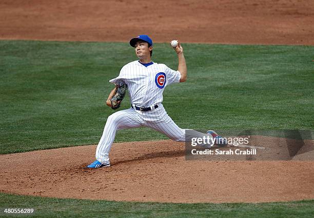 Tsuyoshi Wada of the Chicago Cubs pitches during a game against the Los Angeles Angels of Anaheim at Cubs Park on March 25, 2014 in Mesa, Arizona....