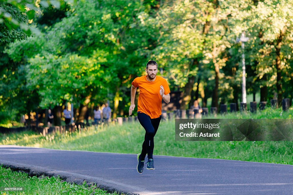 Young man running in the park