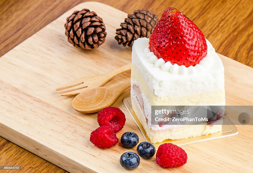 Strawberry cake on wooden background, Cake with strawberries, Pi