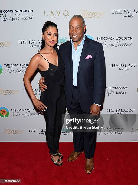 Golfer Seema Sadekar and ESPN personality Jay Harris arrives at the second annual Coach Woodson Las Vegas Invitational pairings party at the Lavo...