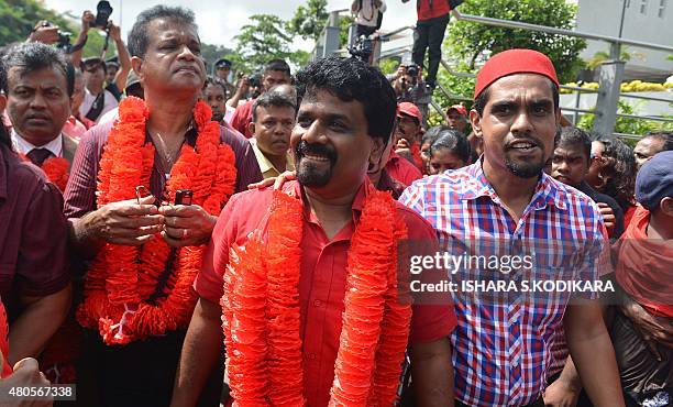 Anura Kumara Dissanayaka , leader of the Marxist JVP or the People's Liberation Front, is garlanded after submitting nominations to stand in...