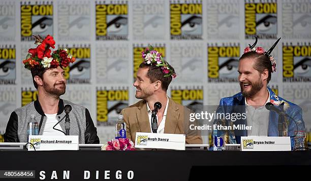 Actors Richard Armitage and Hugh Dancy and executive producer/creator Bryan Fuller wear flower crowns at the "Hannibal" Savor the Hunt panel during...