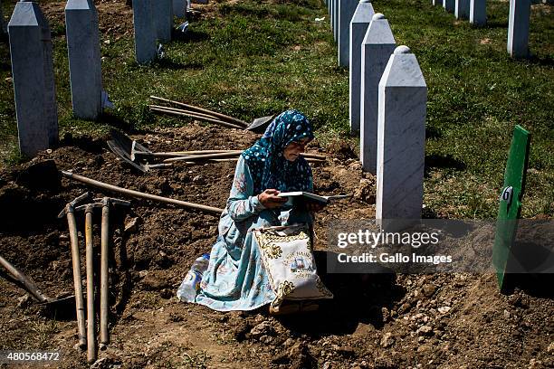 Relatives of victims mourn their loss on July 11, 2015 at the Srebrenica- Potocari Memorial and Cemetery at Potocari, Bosnia. During the 1992-1995...