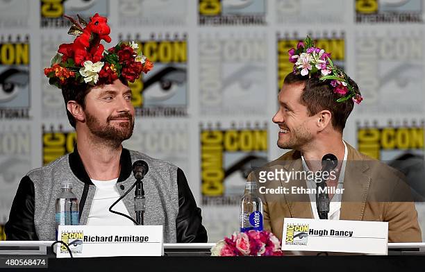 Actors Richard Armitage and Hugh Dancy wear flower crowns at the "Hannibal" Savor the Hunt panel during Comic-Con International 2015 at the San Diego...