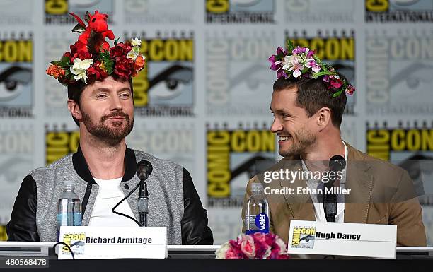 Actors Richard Armitage and Hugh Dancy wear flower crowns at the "Hannibal" Savor the Hunt panel during Comic-Con International 2015 at the San Diego...