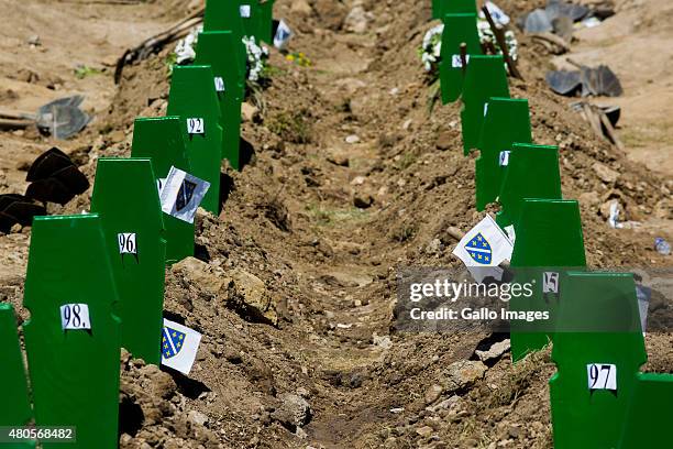 Graves after the burial ceremony on July 11, 2015 at the Srebrenica- Potocari Memorial and Cemetery at Potocari, Bosnia. During the 1992-1995 Bosnian...