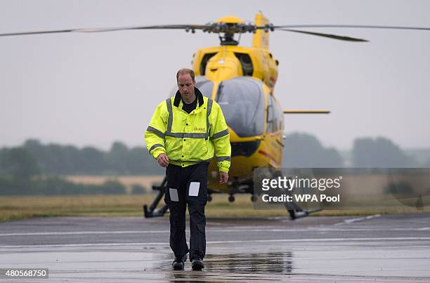 Prince William, The Duke of Cambridge as he begins his new job with the East Anglian Air Ambulance at Cambridge Airport on July 13, 2015 in...
