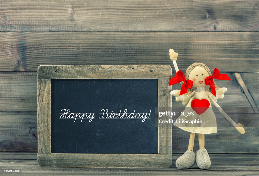 Cute doll with Red Heart. Lovely Birthday decoration. Holidays card