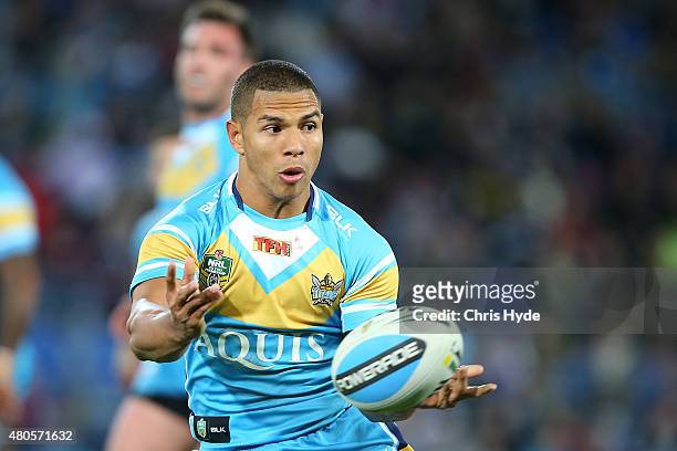David Mead of the Titans passes during the round 18 NRL match between the Gold Coast Titans and the Manly Sea Eagles at Cbus Super Stadium on July...
