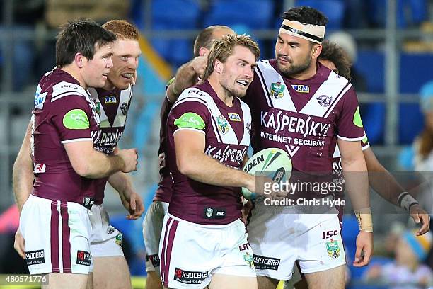 Kieran Foran of the Sea Eagles celebrates a try during the round 18 NRL match between the Gold Coast Titans and the Manly Sea Eagles at Cbus Super...
