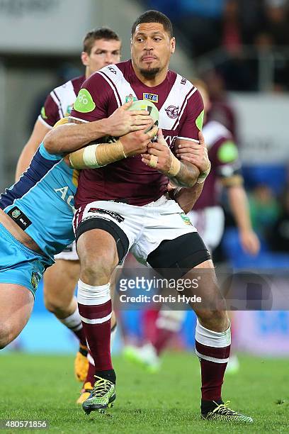 Willie Mason of the Sea Eagles runs the ball during the round 18 NRL match between the Gold Coast Titans and the Manly Sea Eagles at Cbus Super...