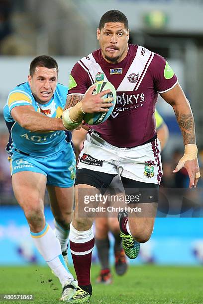 Willie Mason of the Sea Eagles runs the ball during the round 18 NRL match between the Gold Coast Titans and the Manly Sea Eagles at Cbus Super...