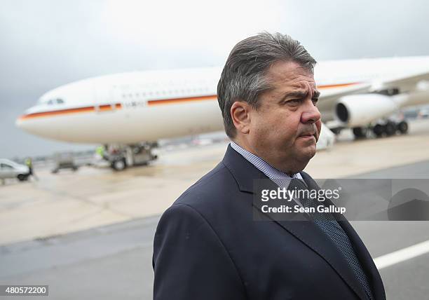 German Vice Chancellor and Economy and Energy Minister Sigmar Gabriel prepares to board a German delegation flight to China after Eurozone and Greek...