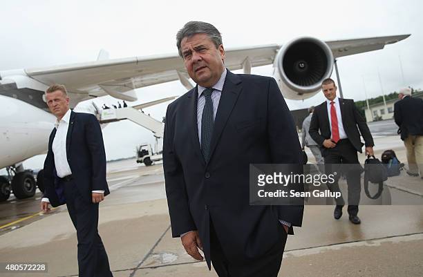 German Vice Chancellor and Economy and Energy Minister Sigmar Gabriel prepares to board a German delegation flight to China after Eurozone and Greek...