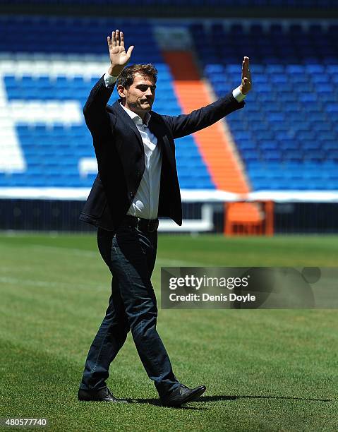Iker Casillas waves to fans at the Santiago Bernabeu stadium after attending a press conference to announce that he will be leaving Real Madrid...
