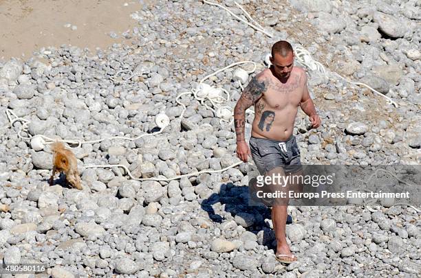 Wesley Sneijder and Yolanthe Cabau are seen on June 21, 2015 in Ibiza, Spain.