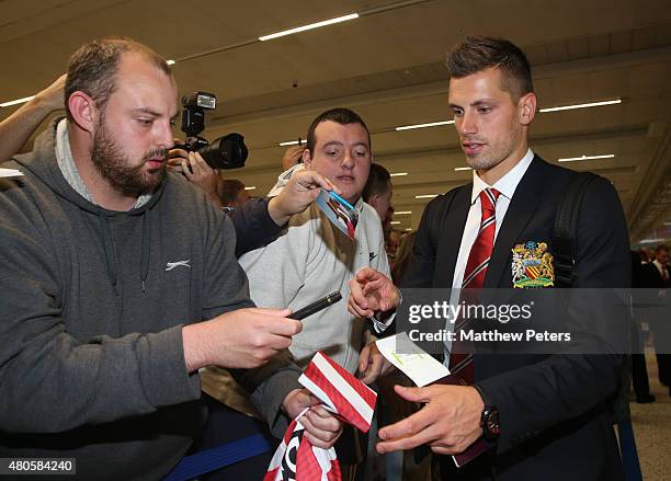 Morgan Schneiderlin of Manchester United leaves for the club's pre-season tour of the USA at Manchester Airport on July 13, 2015 in Manchester,...