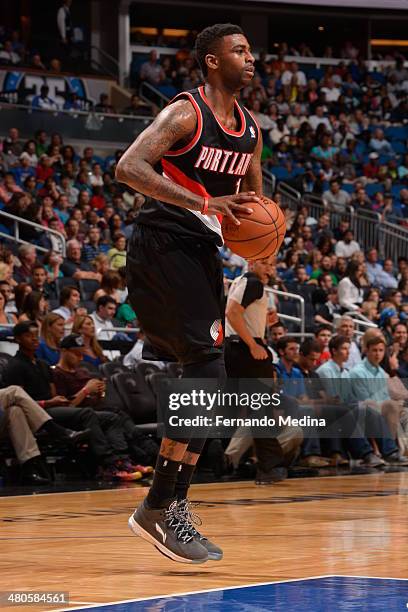 Dorell Wright of the Portland Trail Blazers looks to pass the ball against the Orlando Magic during the game on March 25, 2014 at Amway Center in...