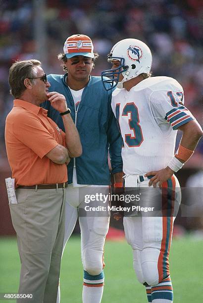Miami Dolphins head coach Don Shula on sidelines with QB Dan Marino and QB Don Strock during game vs San Francisco 49ers at Candlestick Park. San...
