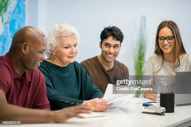 business meeting - district nurse stock pictures, royalty-free photos & images