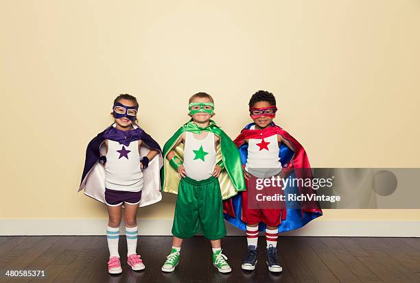 superheroes - young kid and barbell bildbanksfoton och bilder