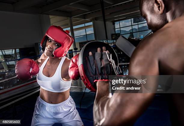 boxer with the trainer - female boxer stock pictures, royalty-free photos & images