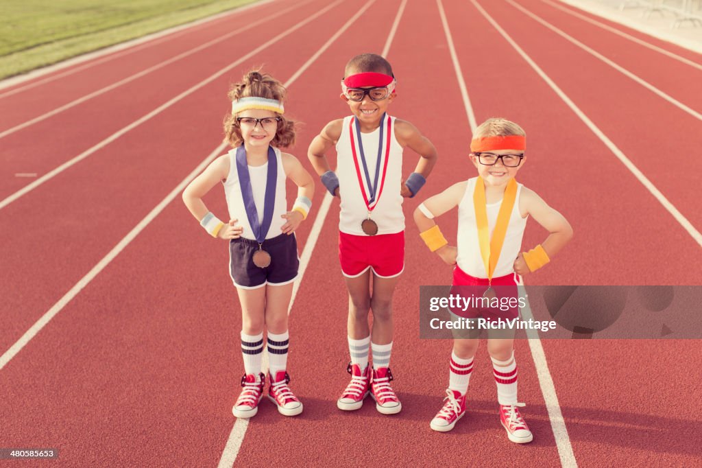 Children Dressed as Nerds at Track Wearing Medals