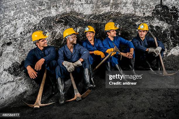 group of miners taking a break - miner helmet portrait stock pictures, royalty-free photos & images