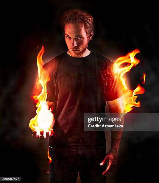 mann auf feuer - dämon-fiktionale-figur stock-fotos und bilder