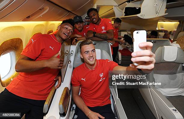 Alex Oxlade Chamberlain, Kieran Gibbs, Calum Chambers, Aaron Ramsey and Chuba Akpom of Arsenal take a selfie as they travel to Singapore for the...