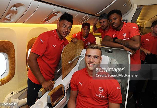 Alex Oxlade Chamberlain, Kieran Gibbs, Calum Chambers, Aaron Ramsey and Chuba Akpom of Arsenal pose for a photo as they travel to Singapore for the...