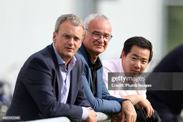 New Leicester City manager Claudio Ranieri watches his new team train for the first time alongside the club's Director of Football Jon Rudkin and...