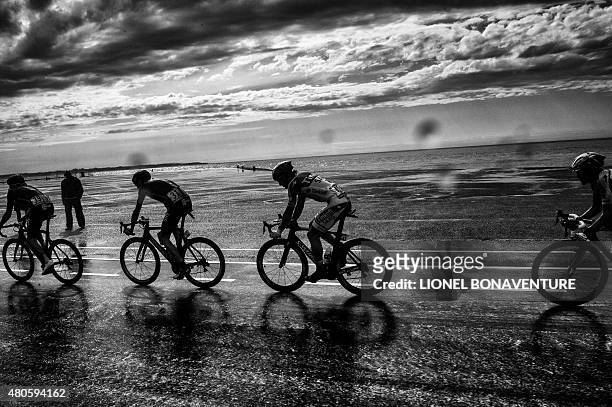 Great Britain's Christopher Froome and Slovakia's Peter Sagan ride in the pack during the 166 km second stage of the 102nd edition of the Tour de...