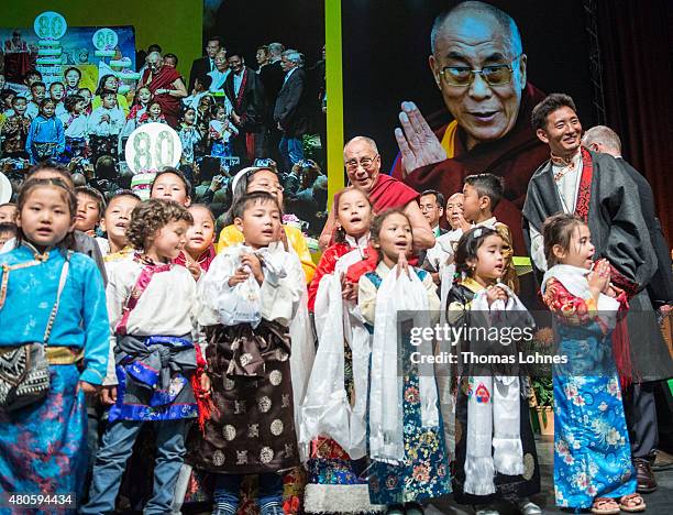 Children sing Happy Birthday to The XIV Dalai Lama during his 80th birthday celebrations at the 'Jahrhunderthalle' on July 13, 2015 in Frankfurt,...