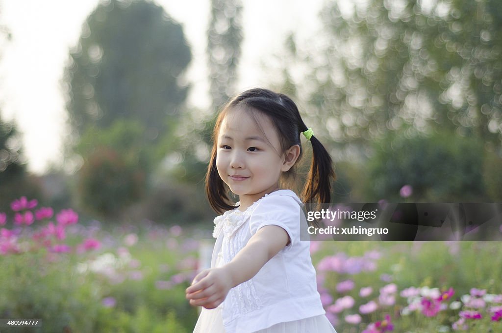 Girl playing in the garden