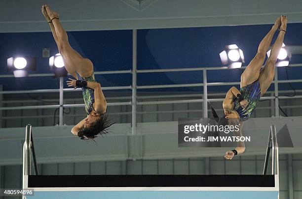 Ingrid De Oliveira and Giovanna Pedroso of Brazil compete in the Women's Synchronized 10M Platform finals at the 2015 Pan American Games in Toronto,...