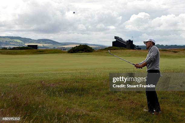 Jordan Spieth of the United States plays a practice round ahead of the 144th Open Championship at The Old Course on July 13, 2015 in St Andrews,...
