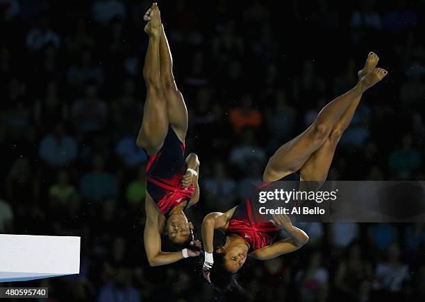 Yaima Mena and Annia Rivera of Cuba dive at the Pan Am Games during the Women' Synchronised 10m Platform Final at the Pan Am Games on July 13, 2015...