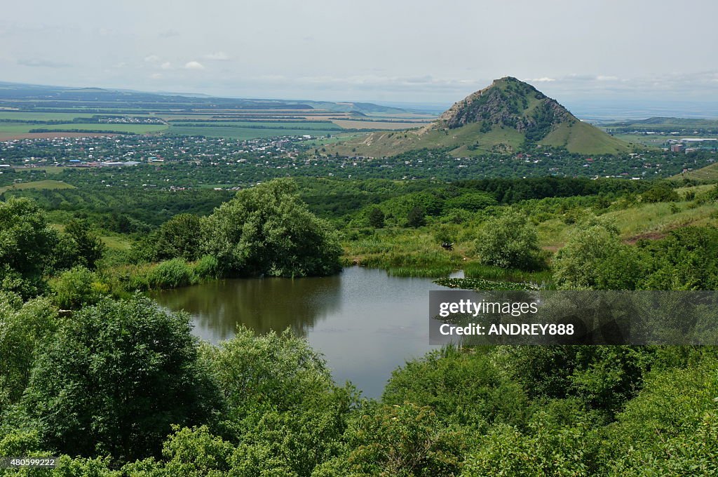 Lake with water lilies among the mountains