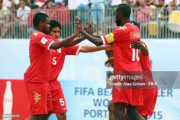 Hani al Dhabat of Oman celebrates a goal with team mates during the FIFA Beach Soccer World Cup Portugal 2015 Group B match beween Oman and Costa...