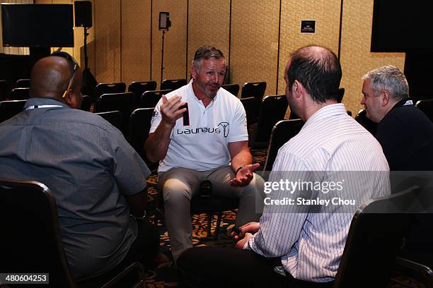 Laureus Academy member Sean Fitzpatrick is interviewed by the media at the Fifteen Years of Laureus Press Conference ahead of the 2014 Laureus World...