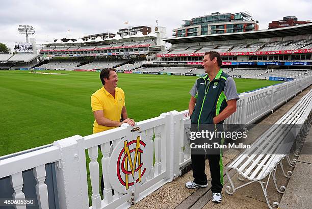 Former Australian Cricketer Glenn McGrath talks with recently retired Australian cricketer Ryan Harris ahead of the 2nd Ashes Test Match at Lord's...