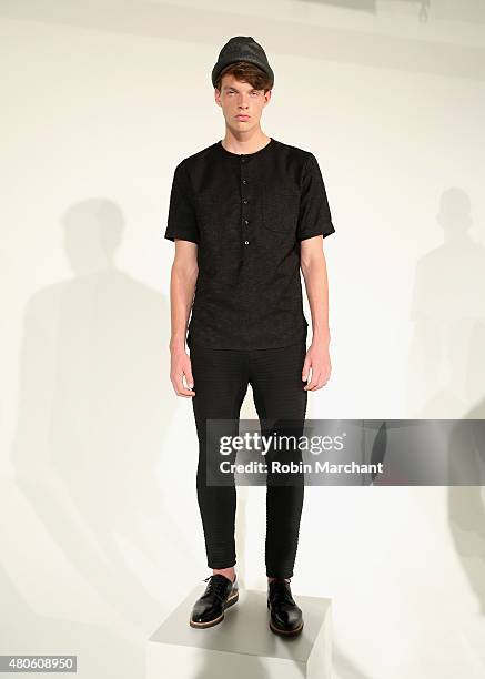 Model poses at Matiere Presentation during New York Fashion Week: Men's S/S 2016 at Industria Superstudio on July 13, 2015 in New York City.