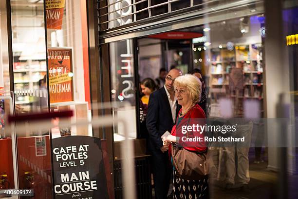 People wait outside Foyles book store to buy "Go Set A Watchman" by Harper Lee which goes on sale shortly after midnight on July 13, 2015 in London,...