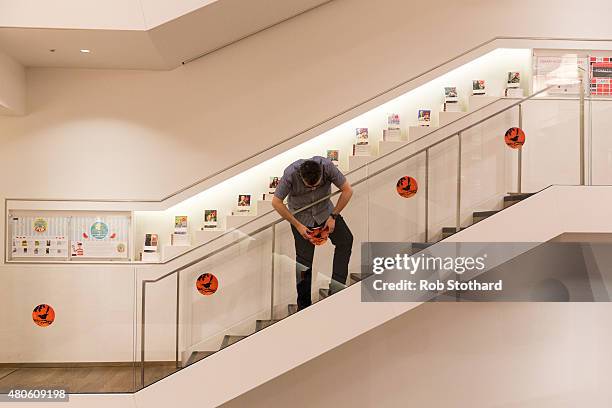 Staff member at Foyles book shop prepare to sell copies of "Go Set A Watchman" by Harper Lee, available shortly after midnight, on July 13, 2015 in...