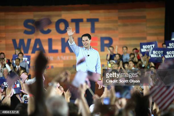 Wisconsin Governor Scott Walker announces to supporters and news media gathered at the Waukesha County Expo Center that he will seek the Republican...